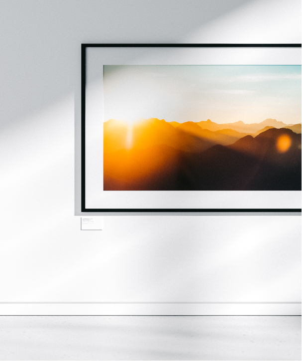 Seymour Sunset in a frame on a wall in a gallery.